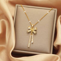 Aurora Bow Gold Plated Necklace – Crystal Cascade Pendant