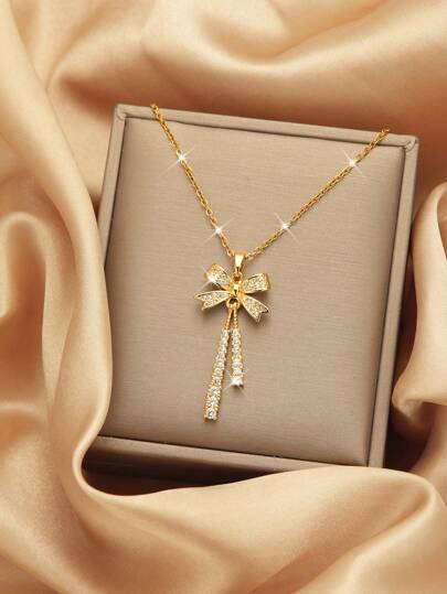 Aurora Bow Gold Plated Necklace – Crystal Cascade Pendant