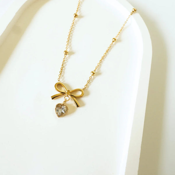 Charmed Bow & Heart Gold Necklace