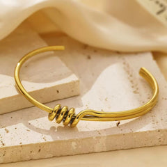 Infinite Knot Open Gold Bracelet