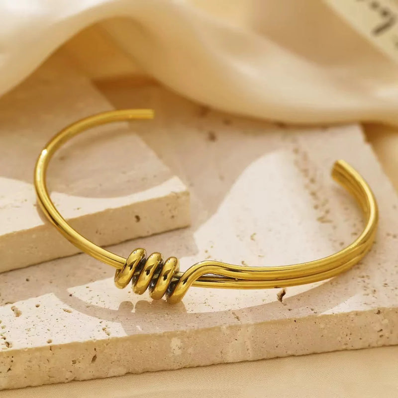 Infinite Knot Open Gold Bracelet