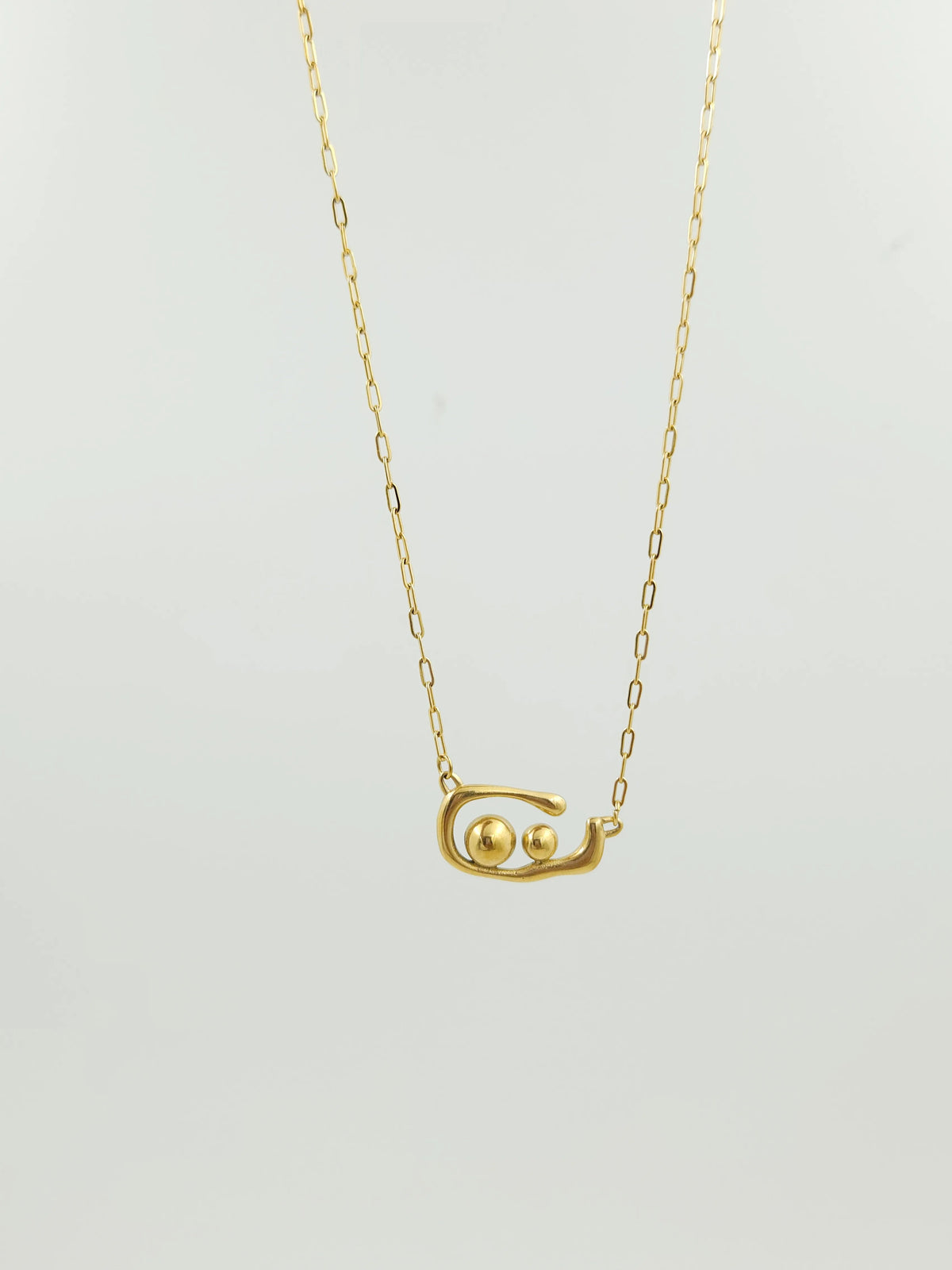 Muse Abstract Gold Pendant Necklace