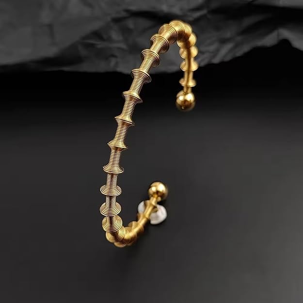 Orbit Coil Statement Bangle