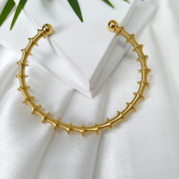 Orbit Coil Statement Bangle