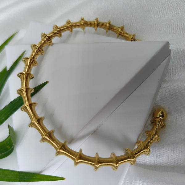 Orbit Coil Statement Bangle