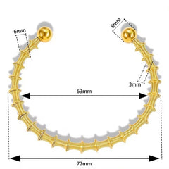 Orbit Coil Statement Bangle