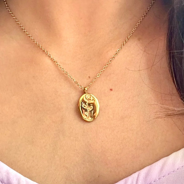 Sculpted Muse Gold Plated Necklace – Artful Face & Flower Medallion