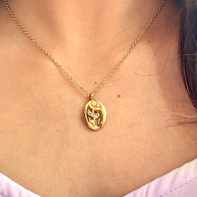 Sculpted Muse Gold Plated Necklace – Artful Face & Flower Medallion