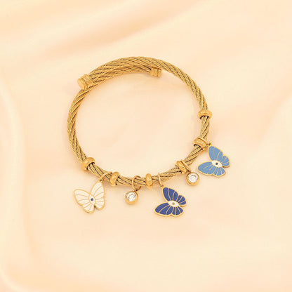 Whimsy Butterfly Charm Gold Cuff Bracelet